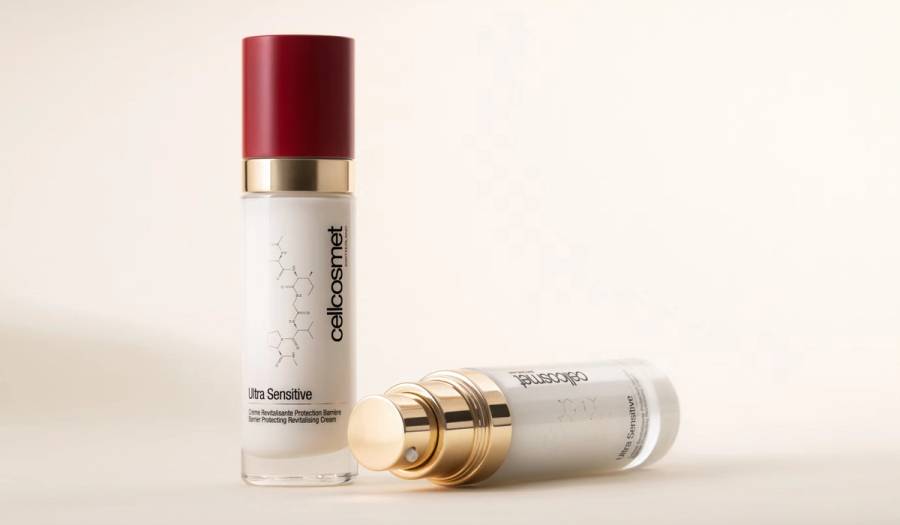 Two bottles of Cellcosmet Ultra Sensitive Barrier Protecting Revitalising Cream on a cream background