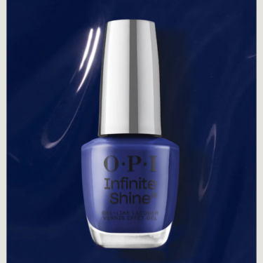 image of OPI No Chip On My Shoulder Infinite Shine nail polish bottle on navy blue background