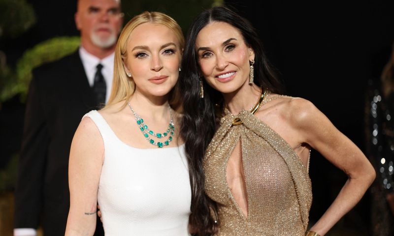 Lindsay Lohan and Demi Moore attend the 2025 Vanity Fair Oscar Party Hosted By Radhika Jones at Wallis Annenberg Center for the Performing Arts on March 02, 2025 in Beverly Hills, California.