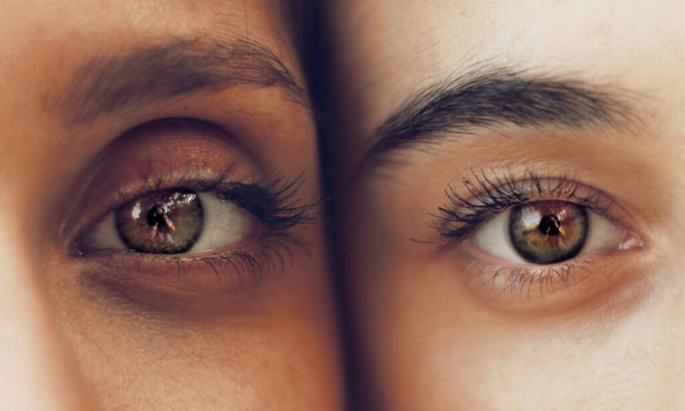 close up of two women's eyes