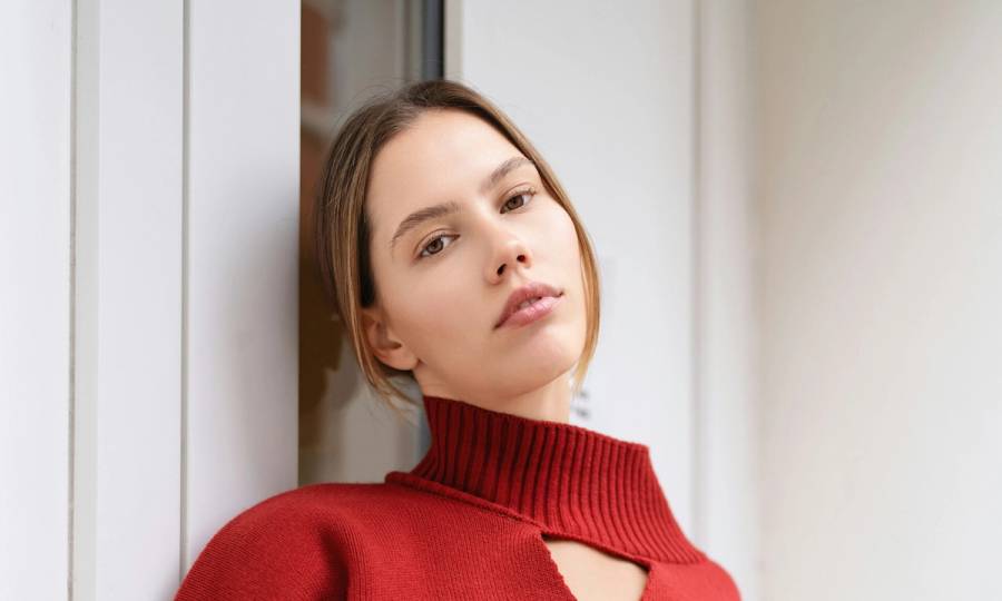 woman in red sweater