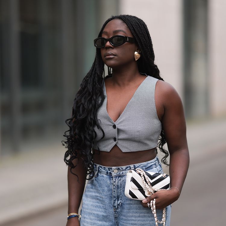 black woman with mermaid braids curled ends