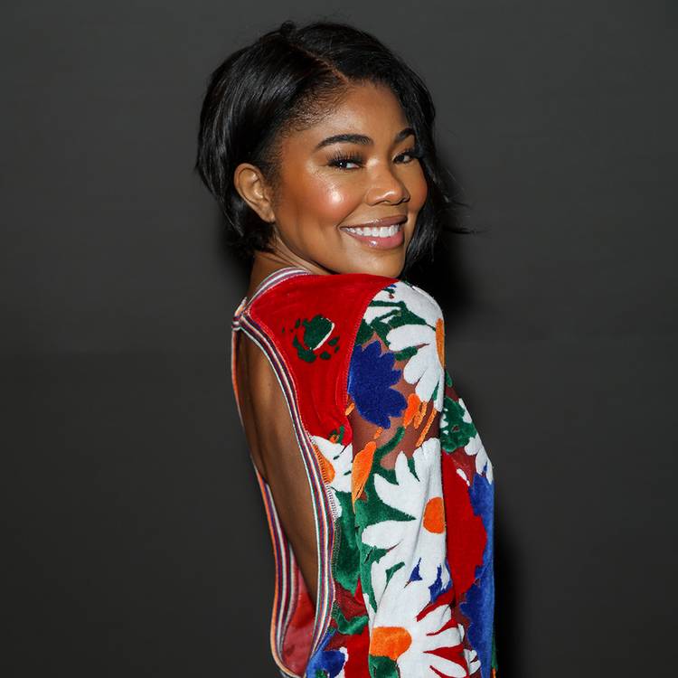 Gabrielle Union in multi-colored dress with open back