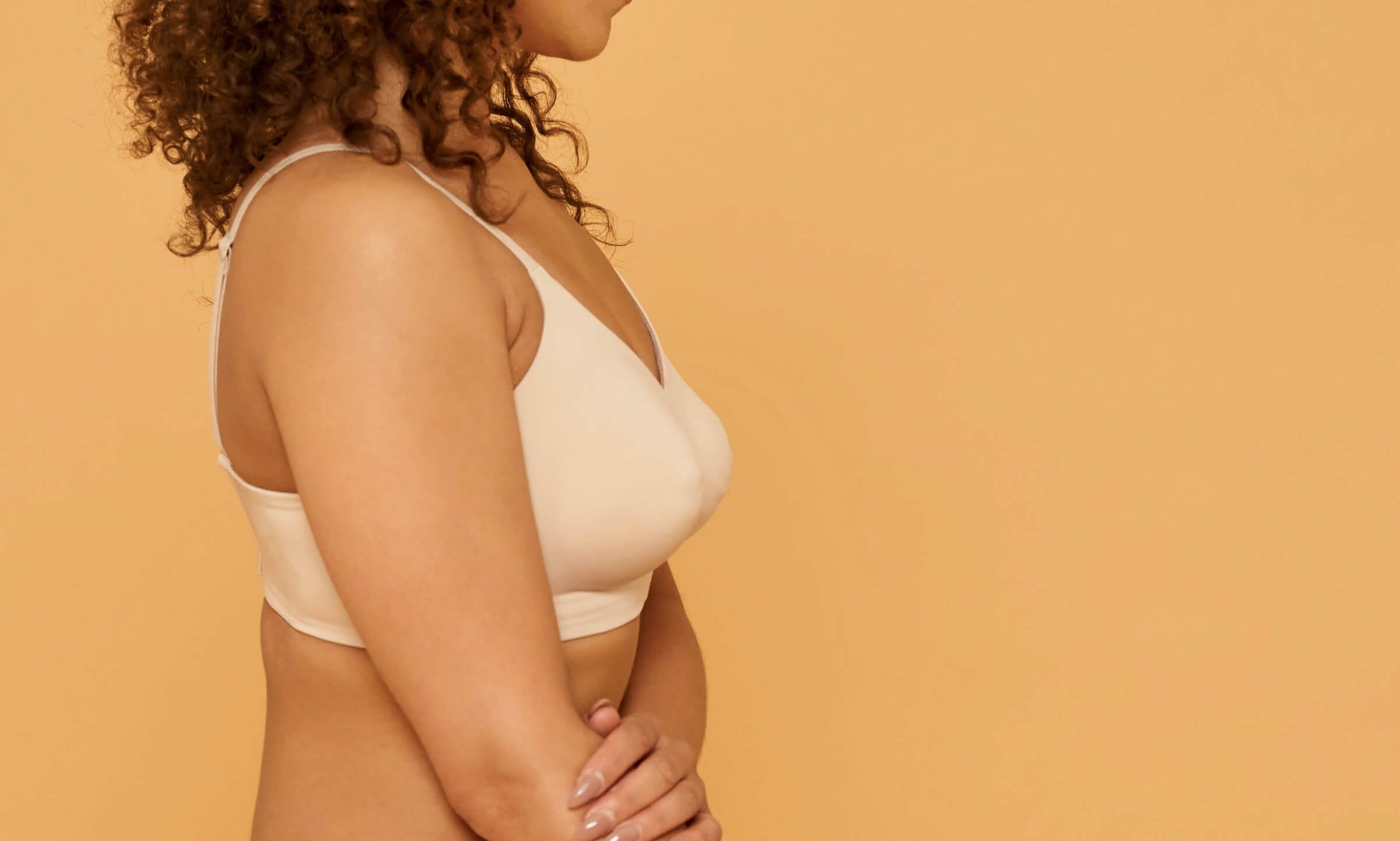 side view of woman's chest and breast area