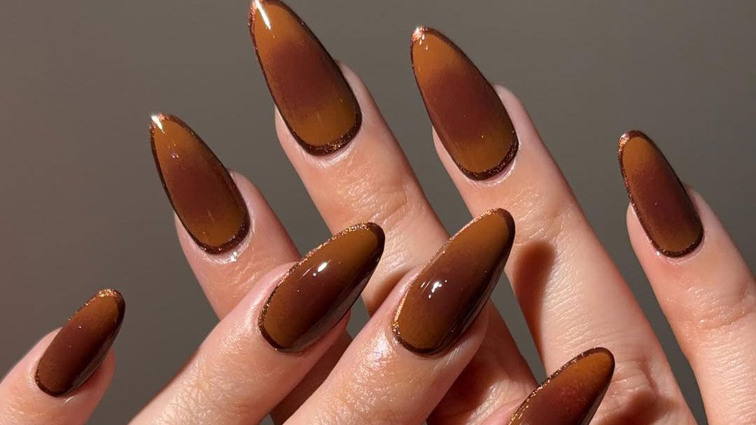 Dark brown aura nails