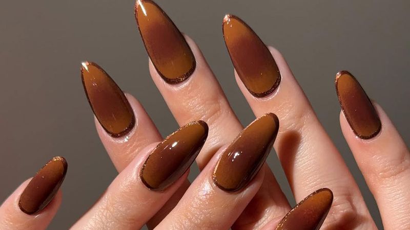 Dark brown aura nails
