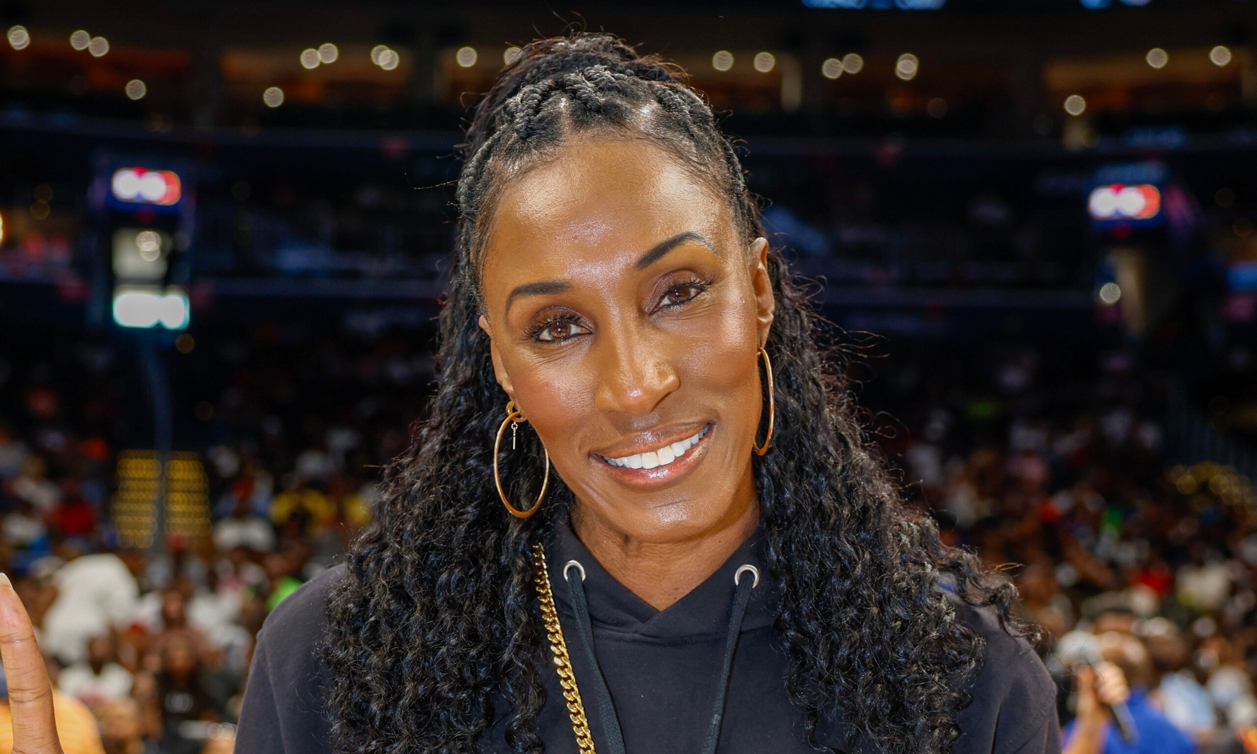 Lisa Leslie poses during basketball game