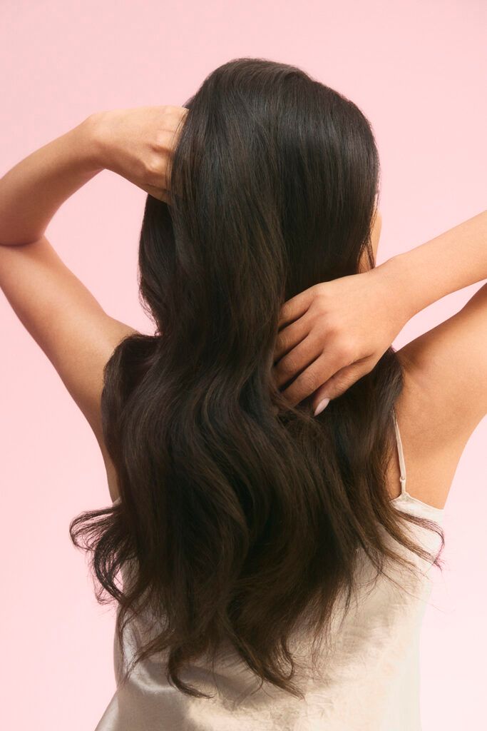 back view woman with long hair