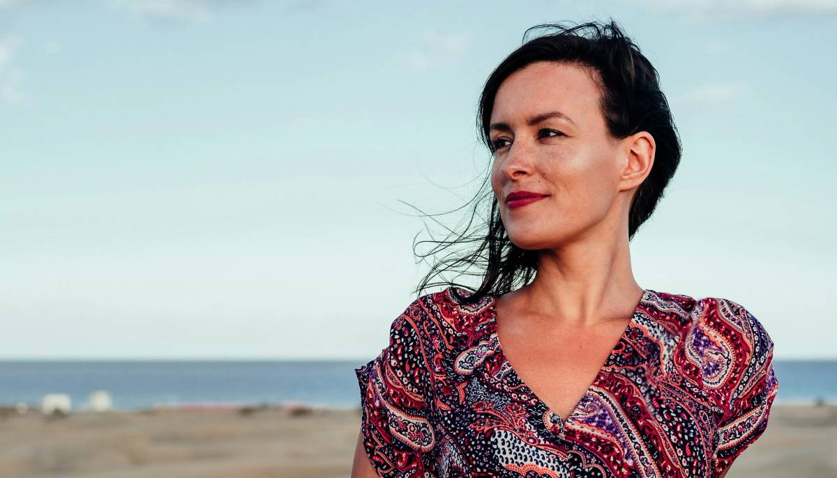 Woman sitting on the beach