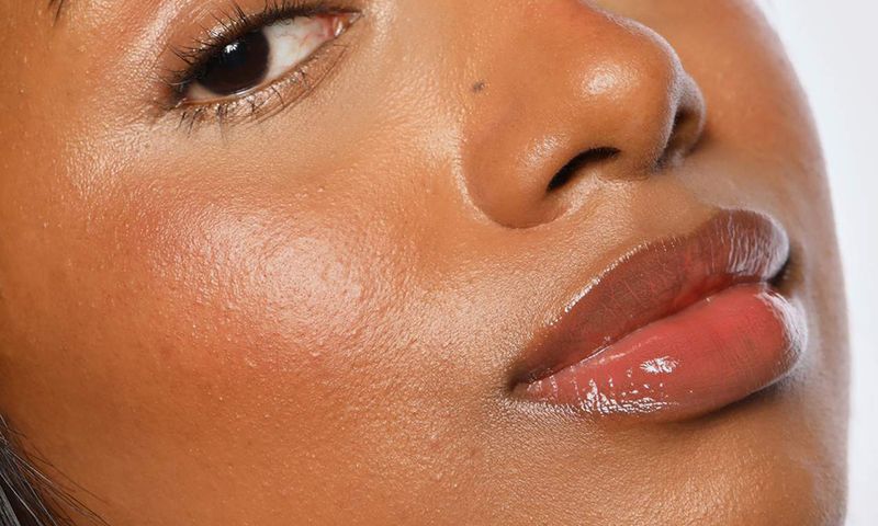 zoomed in image of woman wearing REFY lip gloss