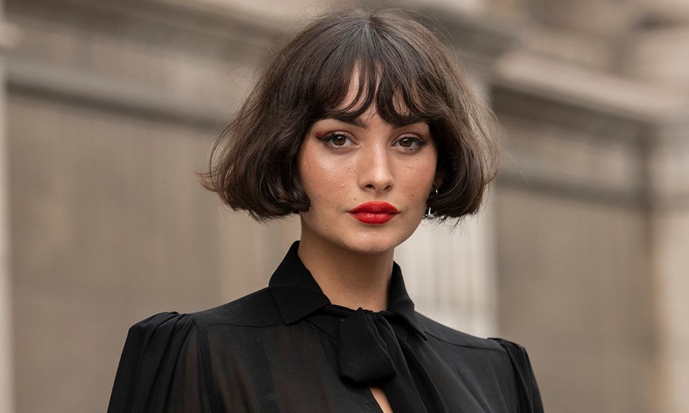 French woman with short bob and red lips