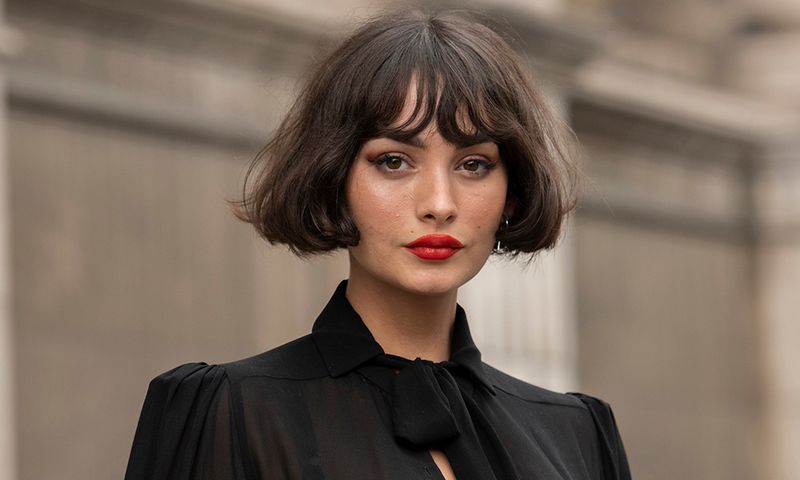 French woman with short bob and red lips
