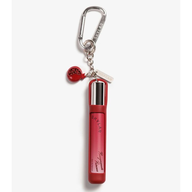 Skylar Pomegranate Princess fragrance keychain bag charm, a portable perfume accessory with red case and clip for on-the-go scent