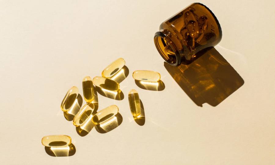 oral supplements beige background