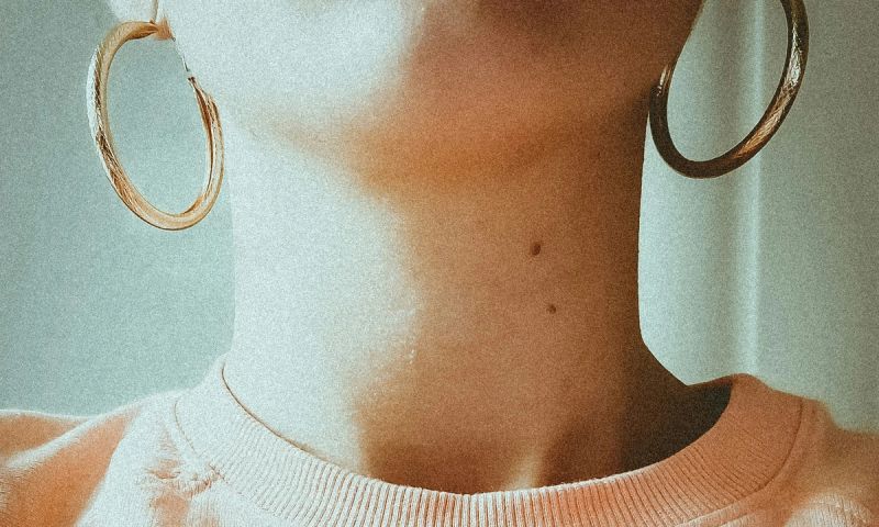 image of young woman's neck