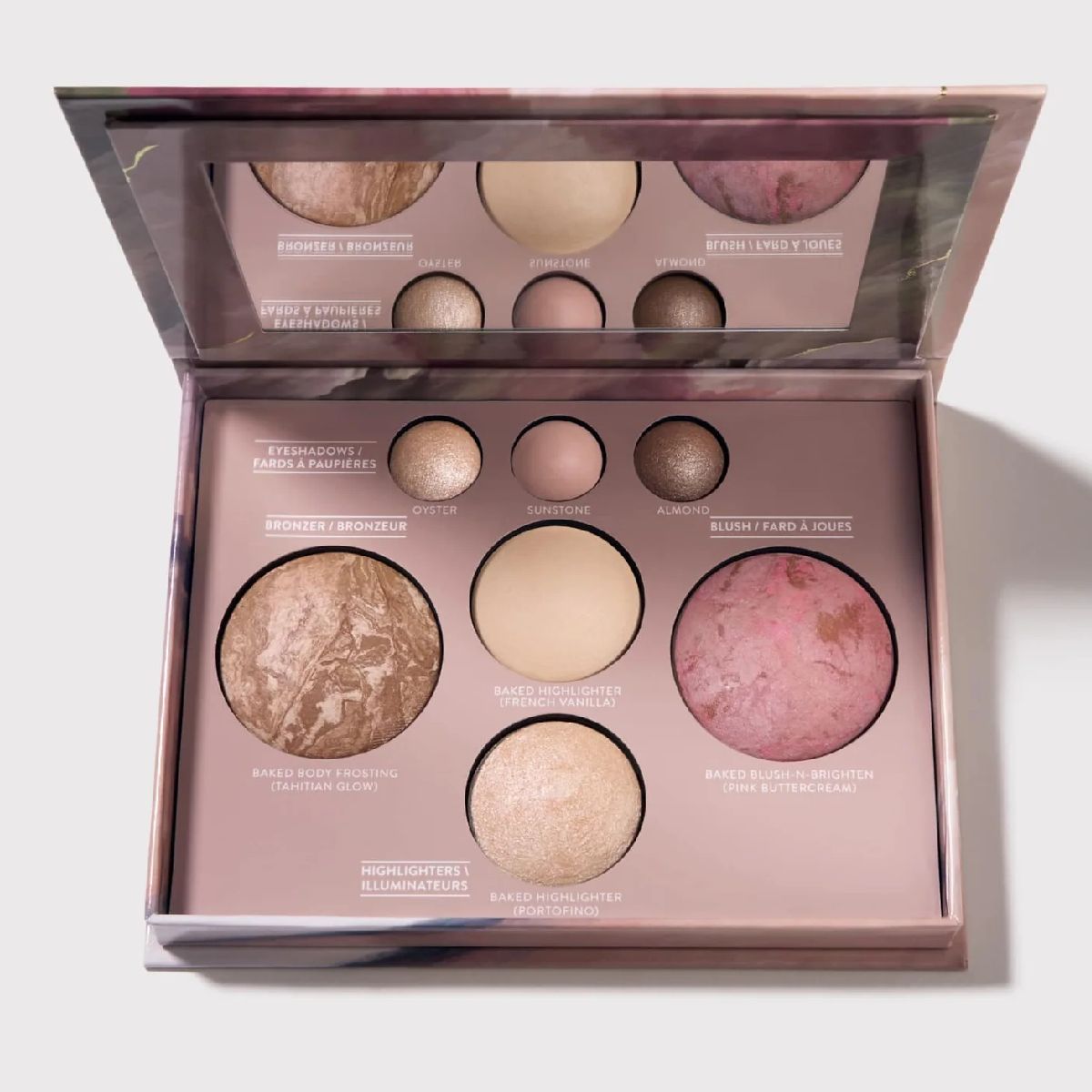 Laura Geller baked face palette with bronzer, blush, highlighter and eyeshadows in warm pink and bronze tones, shown open with mirror.