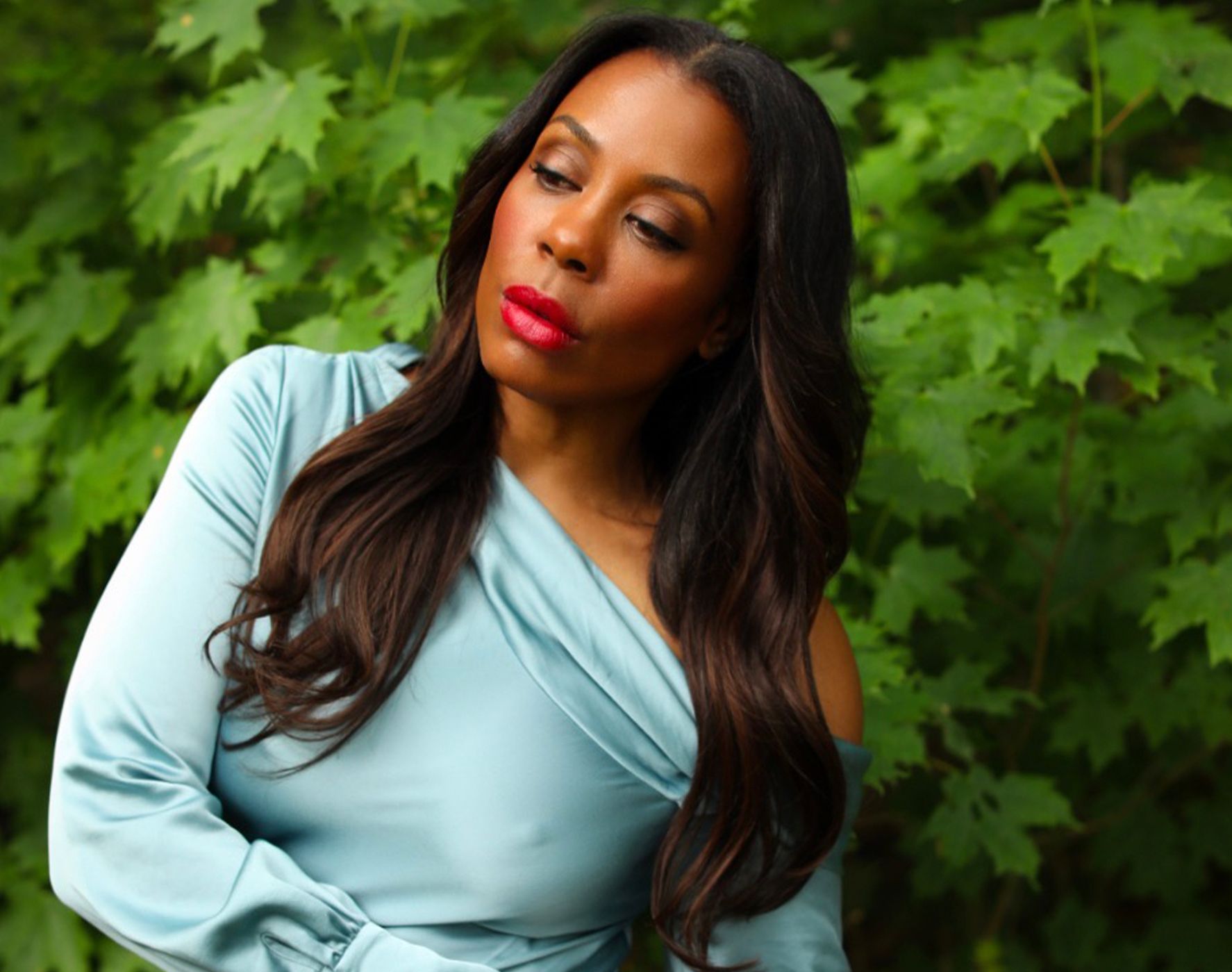 “And Just Like That…” Star Karen Pittman on Self-Care, Derm-Approved Serums and Dating