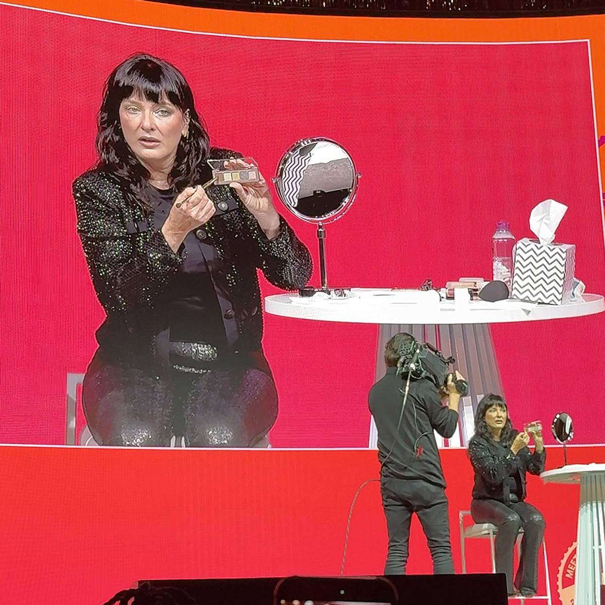 Natasha Denona doing a demo on stage at Ulta Beauty World Masterclass Day.