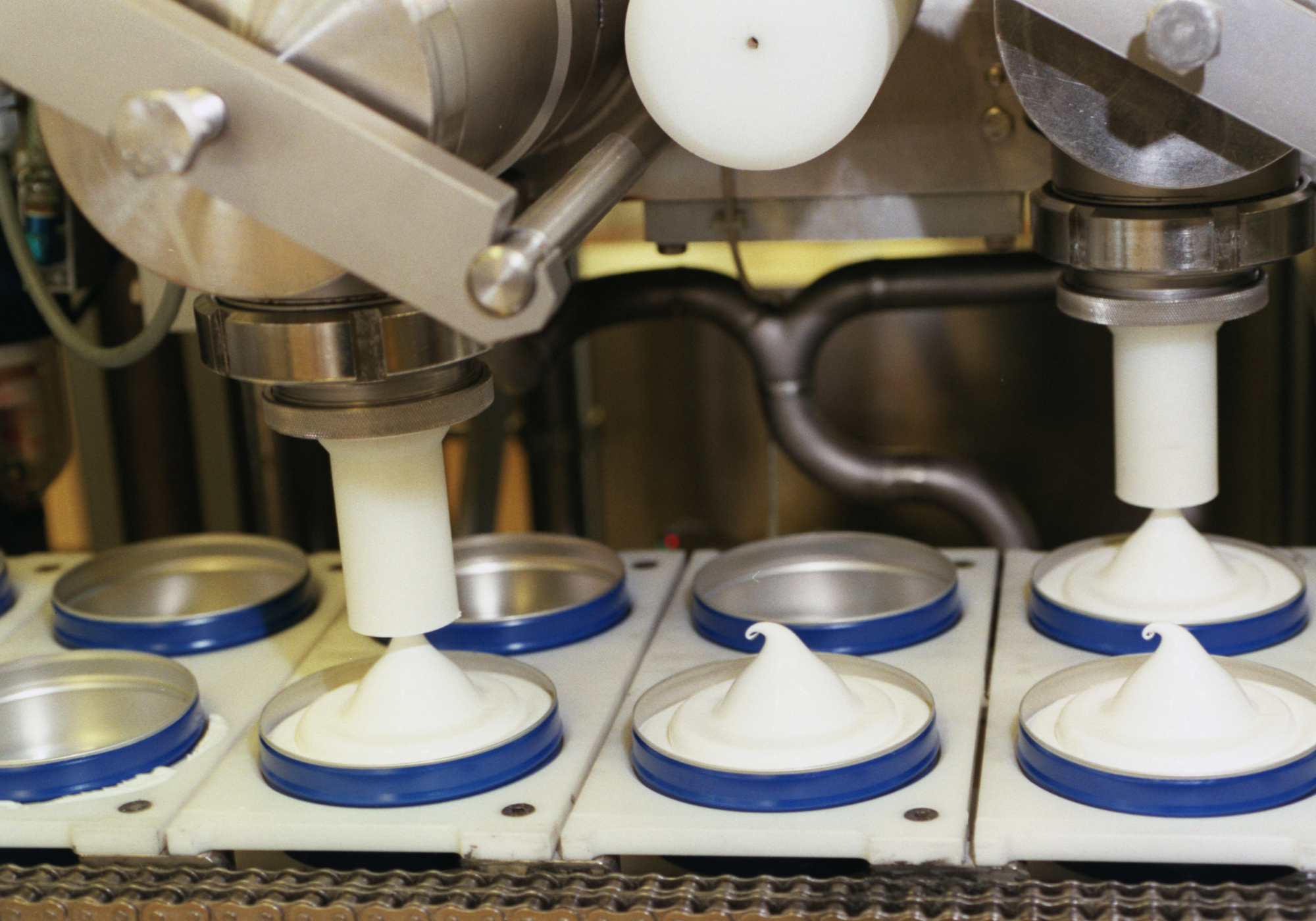 A factory in Hamburg packaging tins of Nivea lotion