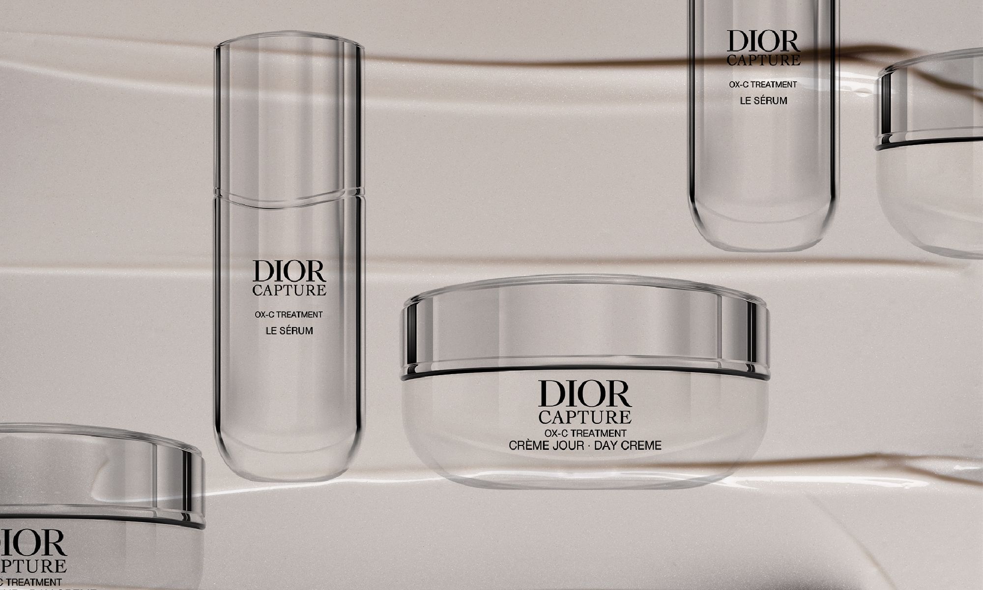 Dior Capture OX-C serum and day cream on a skin care smear background