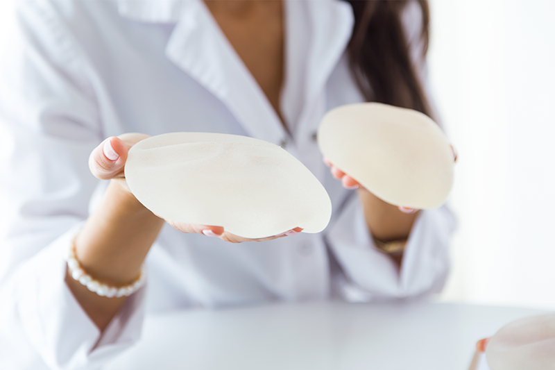 The ‘Hybrid’ Breast Aug Procedure This Plastic Surgeon Says Is Trending