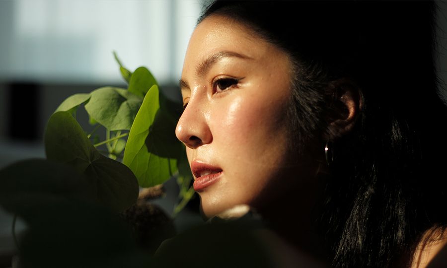 Asian woman portrait in sunlight