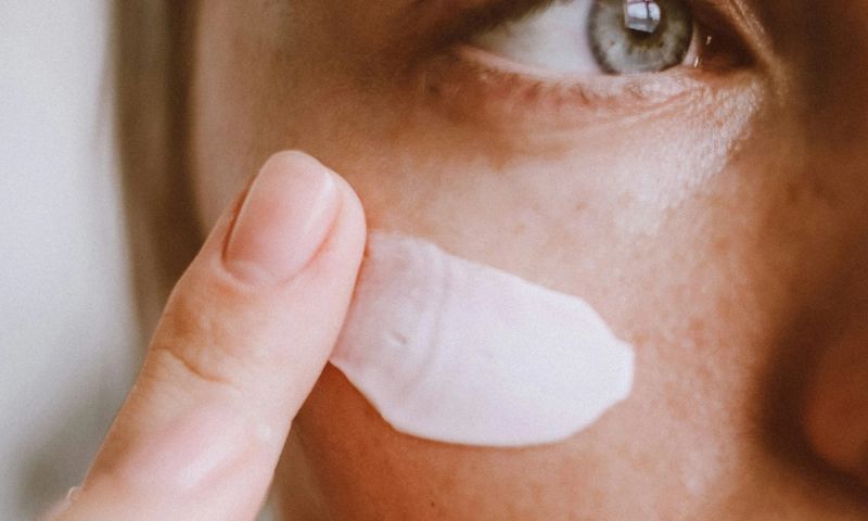 face cream up close on cheek