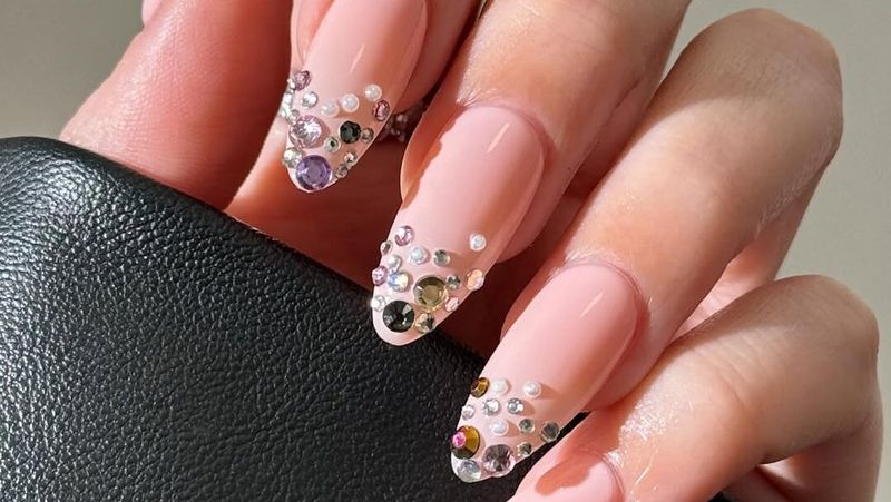 Manicure with crystal decorated French tips