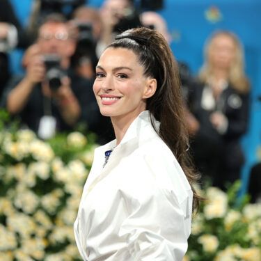 Anne Hathaway attends the 2025 Met Gala Celebrating "Superfine: Tailoring Black Style" at Metropolitan Museum of Art on May 05, 2025 in New York City.