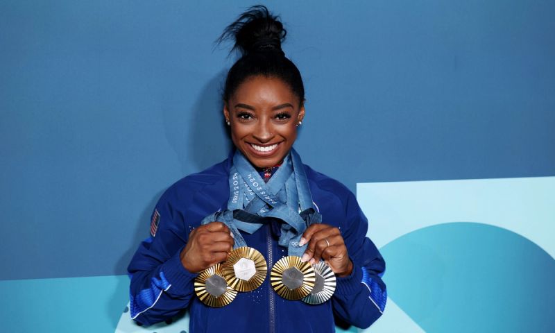 Simone Biles of Team United States poses with her Paris 2024 Olympic medals