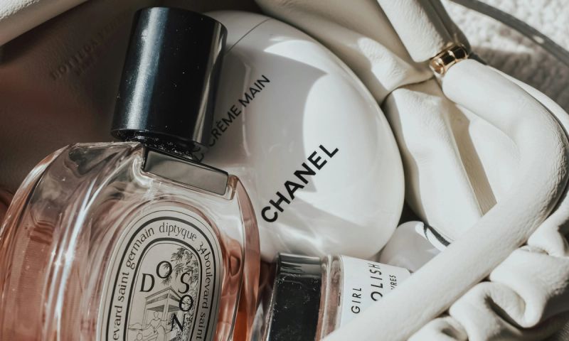 chanel and dipityque beauty products in a bag