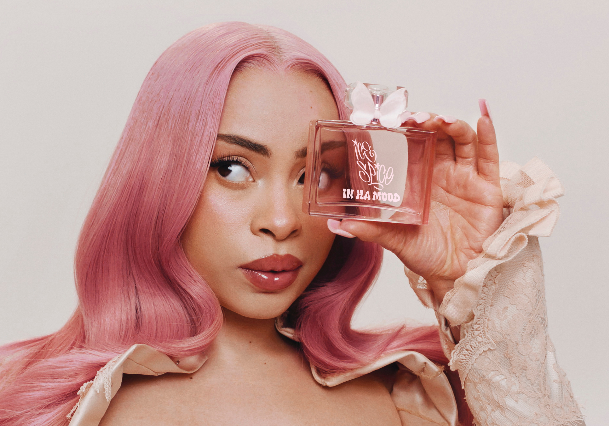 Ice Spice shows off her debut fragrance, In Ha Mood, out now at Ulta Beauty.