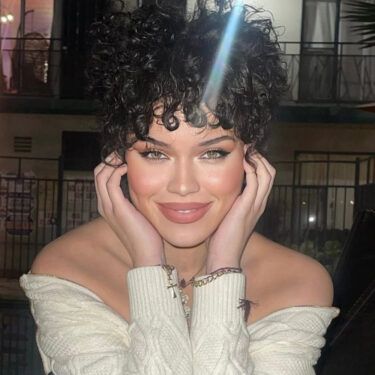 Cropped curly pixie haircut