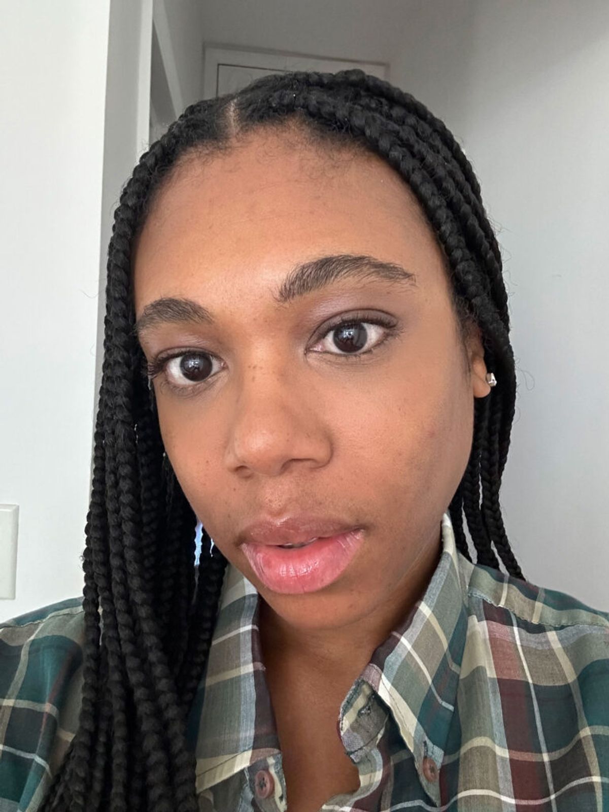 Woman wearing under-eye concealer