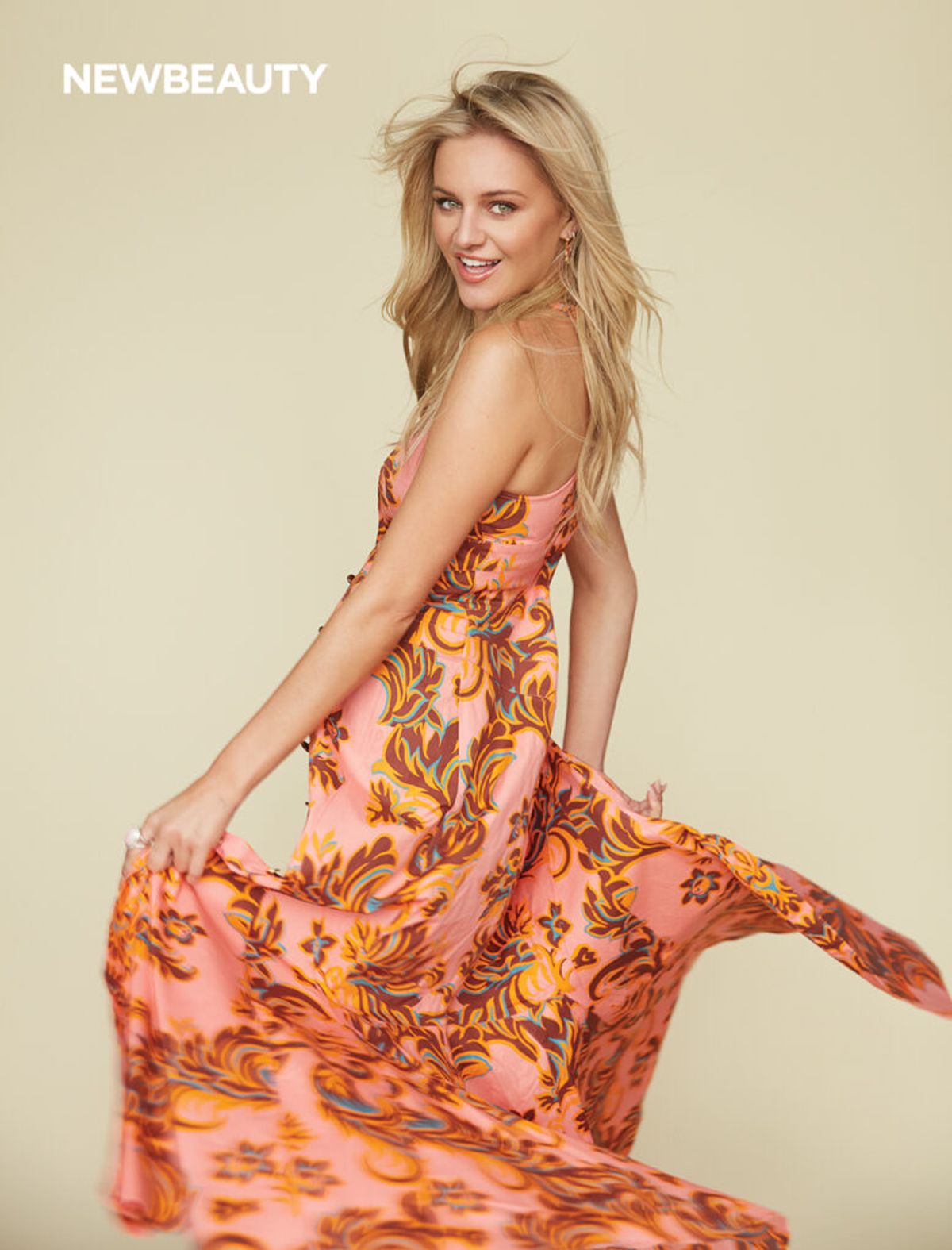 kelsea ballerini wearing orange dress