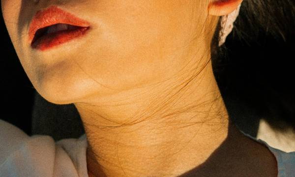 woman's chin and jaw area in sunlight