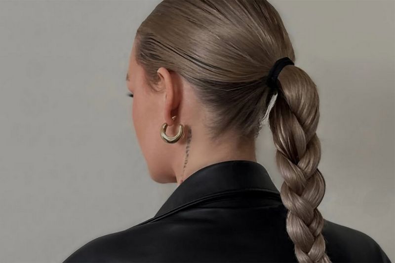 back view of woman with braided ponytail hairstyle