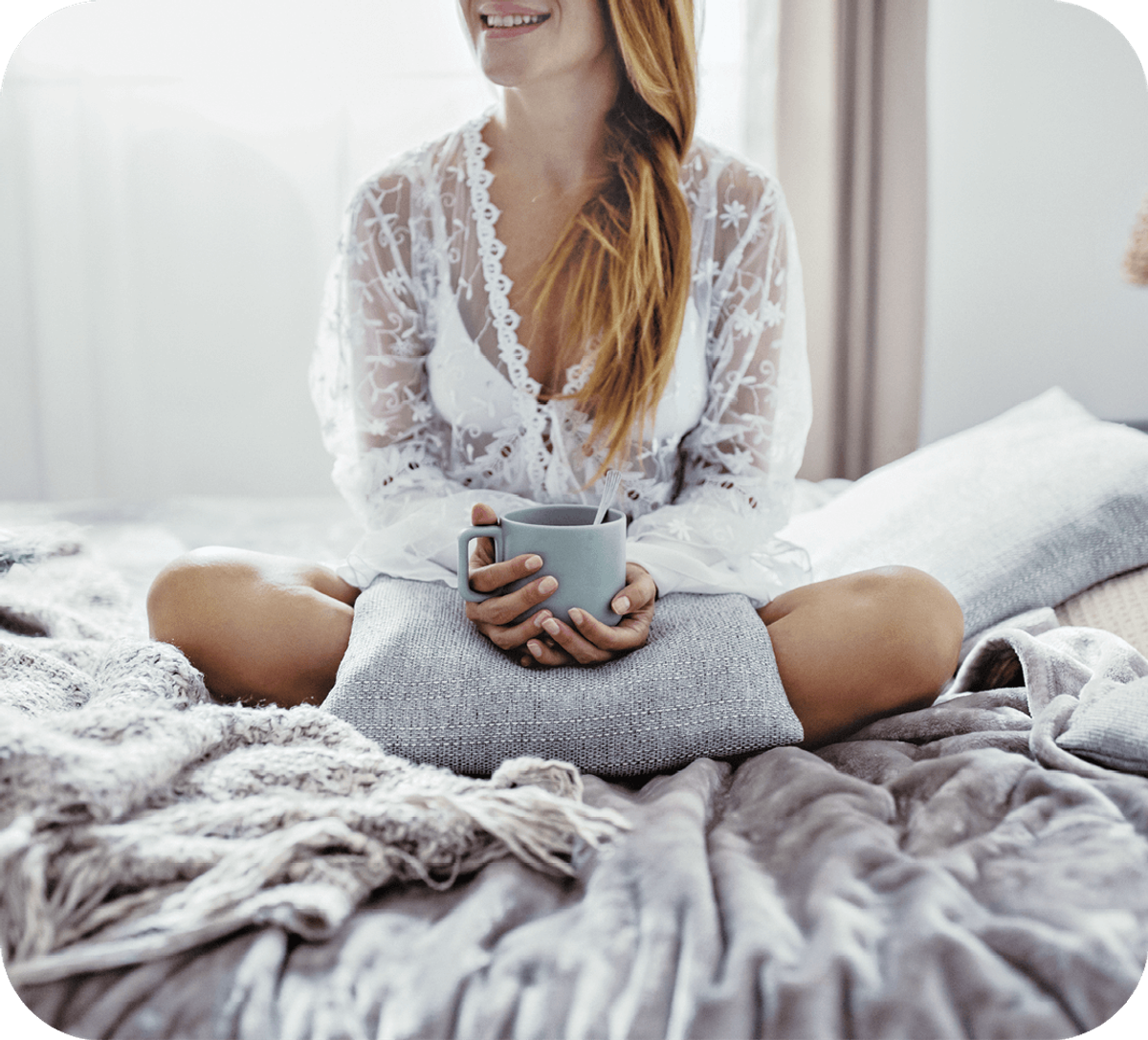 sitting in bed with coffee