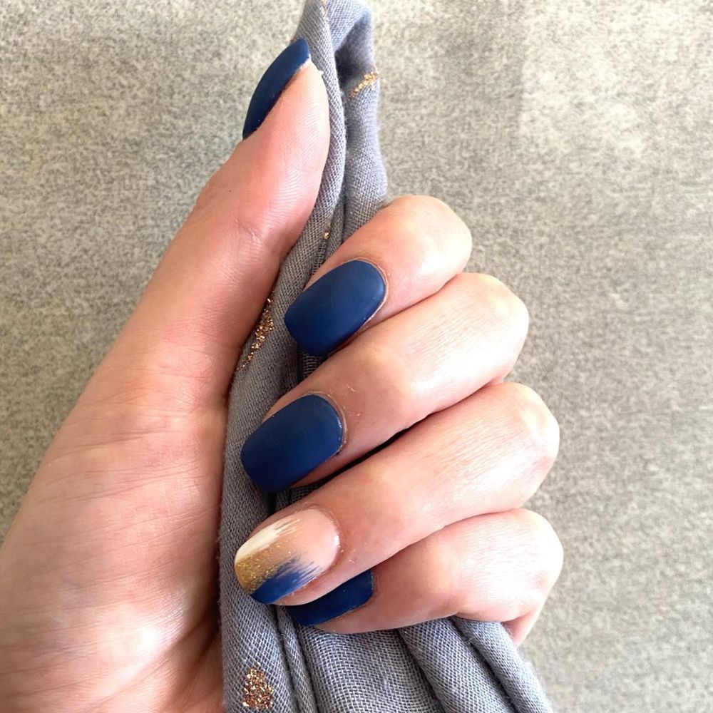 Navy matte manicure with an accent nail