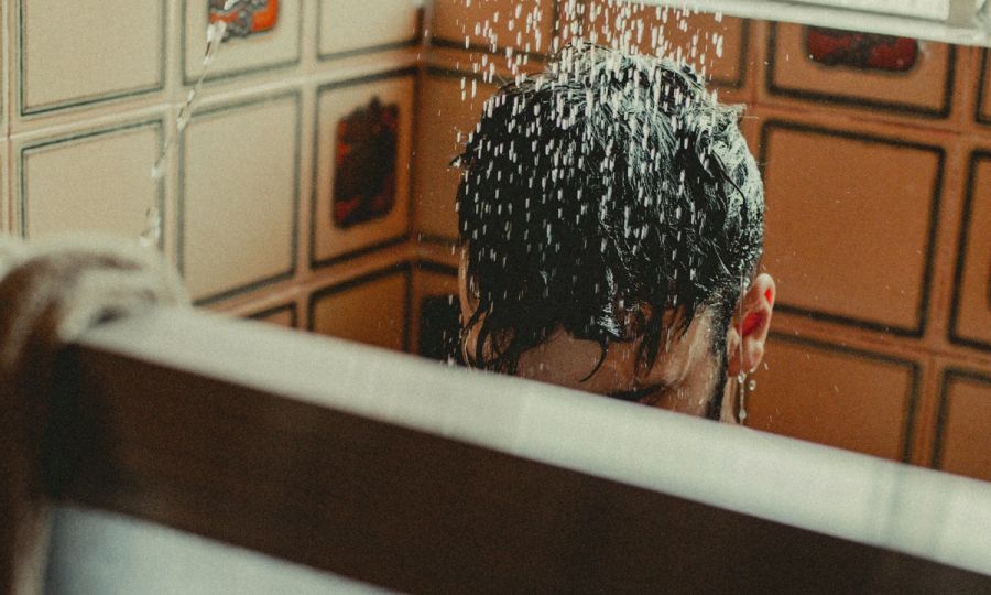 man in shower