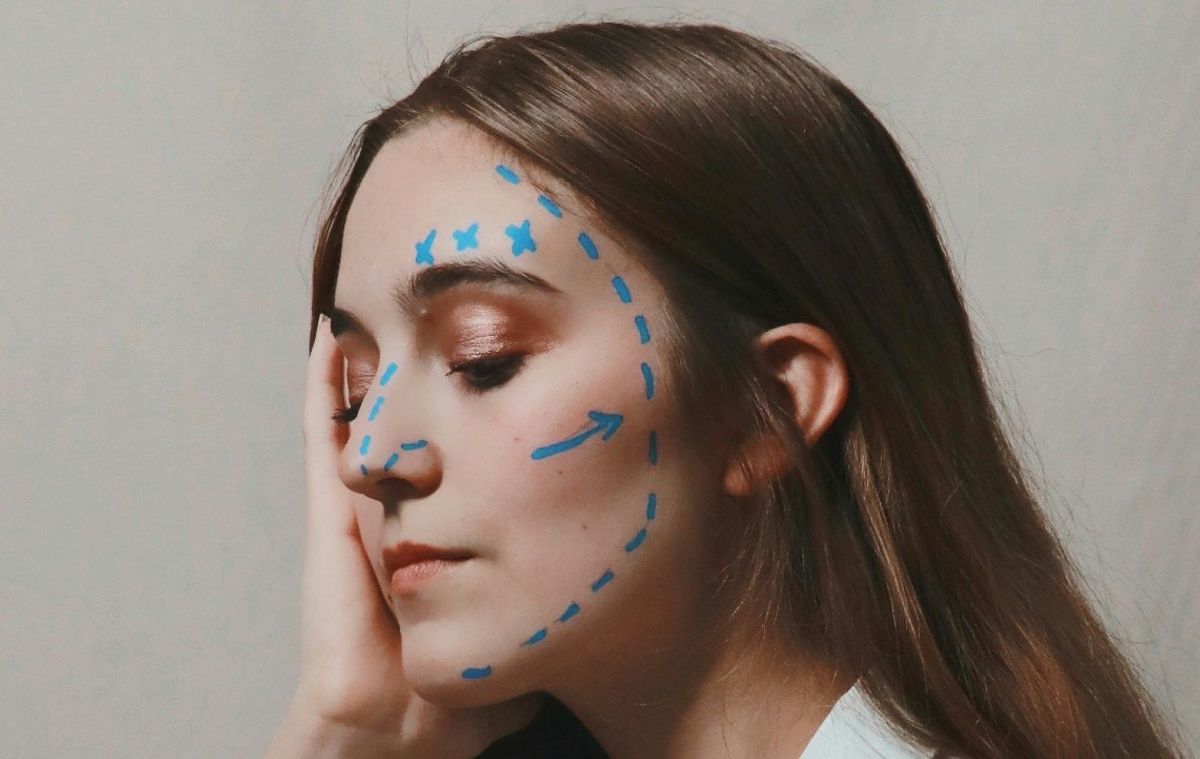 woman with markings on face