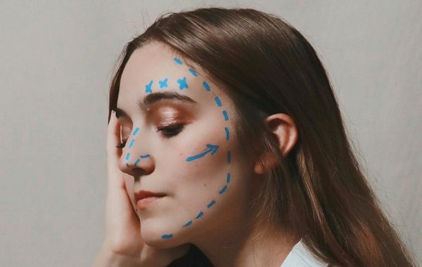 woman with markings on face