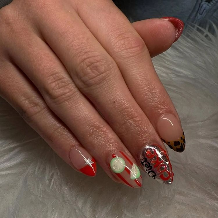 While the term “clashing” gets a bad rap, this manicure proves it doesn’t have to. With a mix of red French tips topped with silver stars, cheetah-print French tips, stripes and Diet Coke logo accents, all tied together with an almond shape, it feels polished with a touch of whimsy.