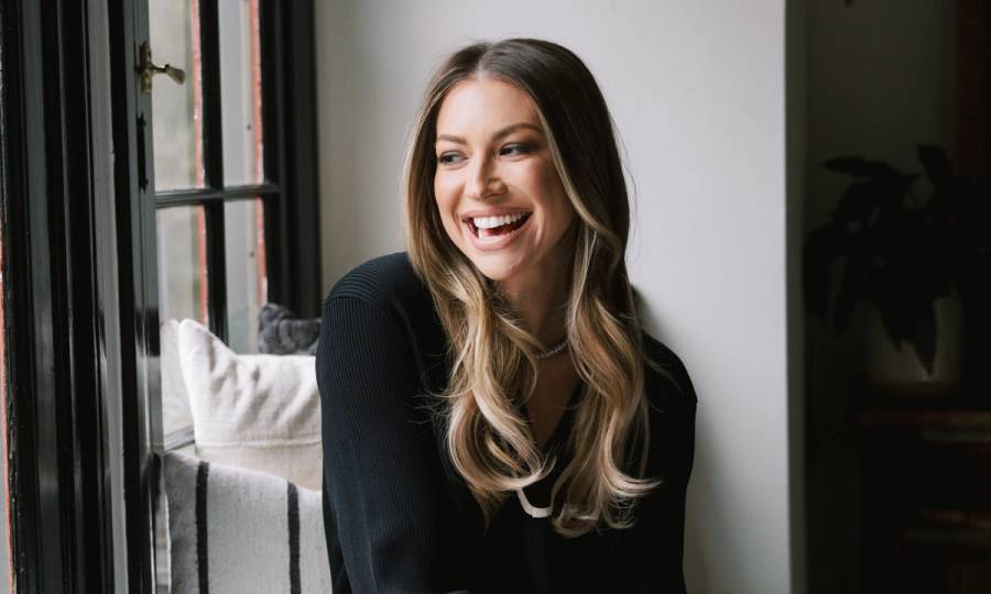 Stassi Schroeder Clark looking out window