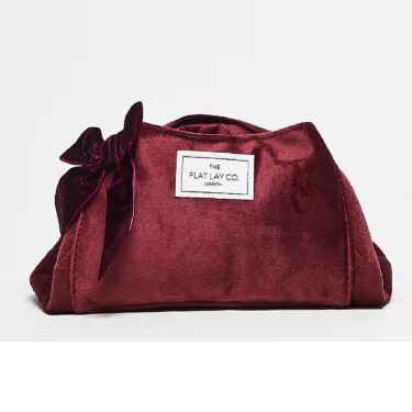 the flat lay co burgundy velvet makeup bag