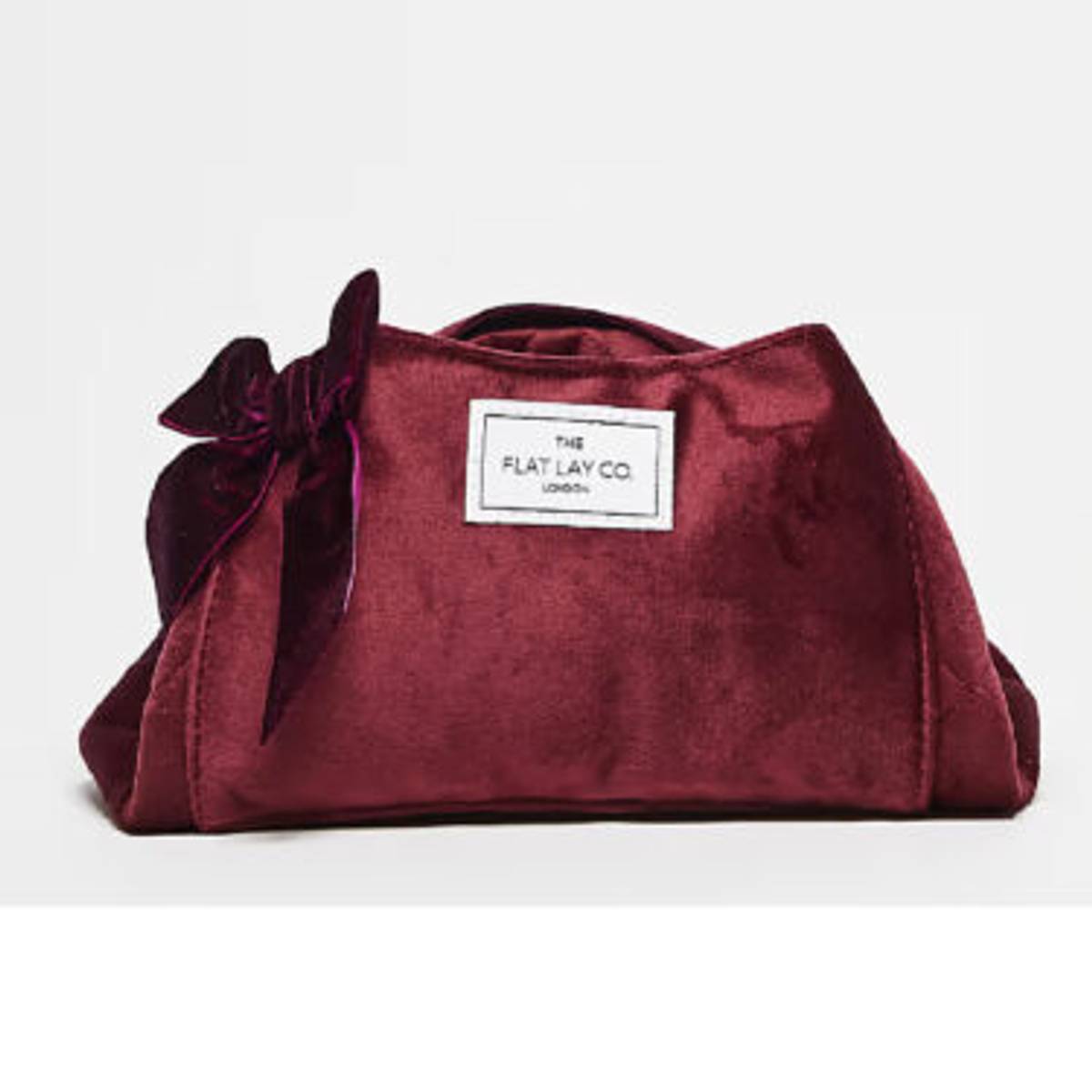 the flat lay co burgundy velvet makeup bag