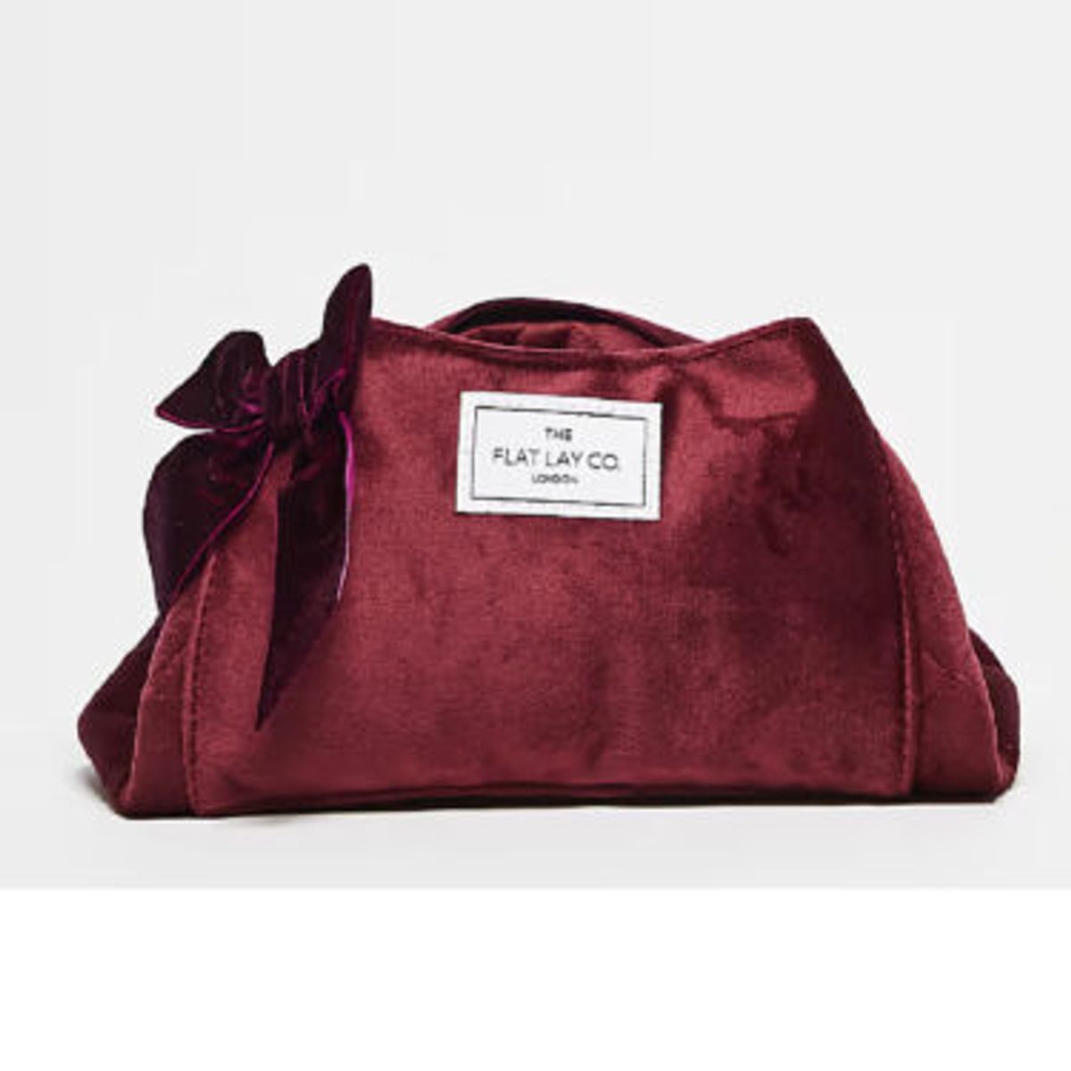 the flat lay co burgundy velvet makeup bag