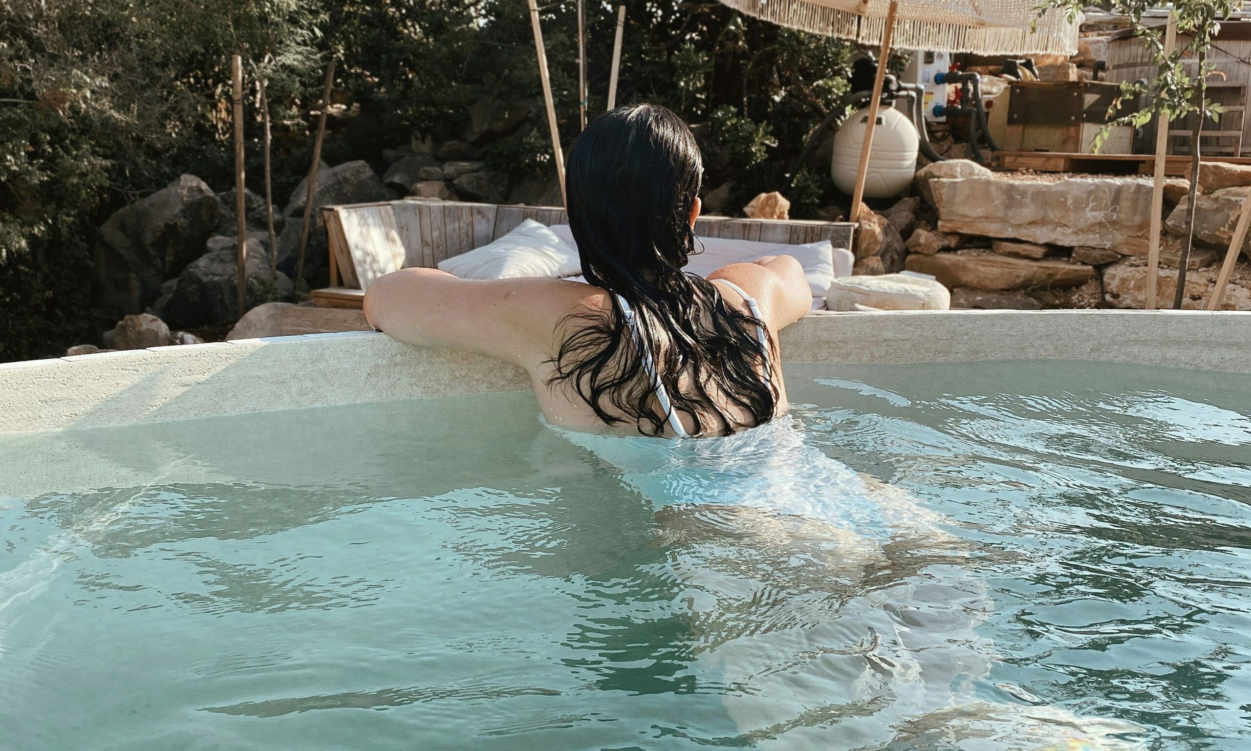 back view of woman in pool