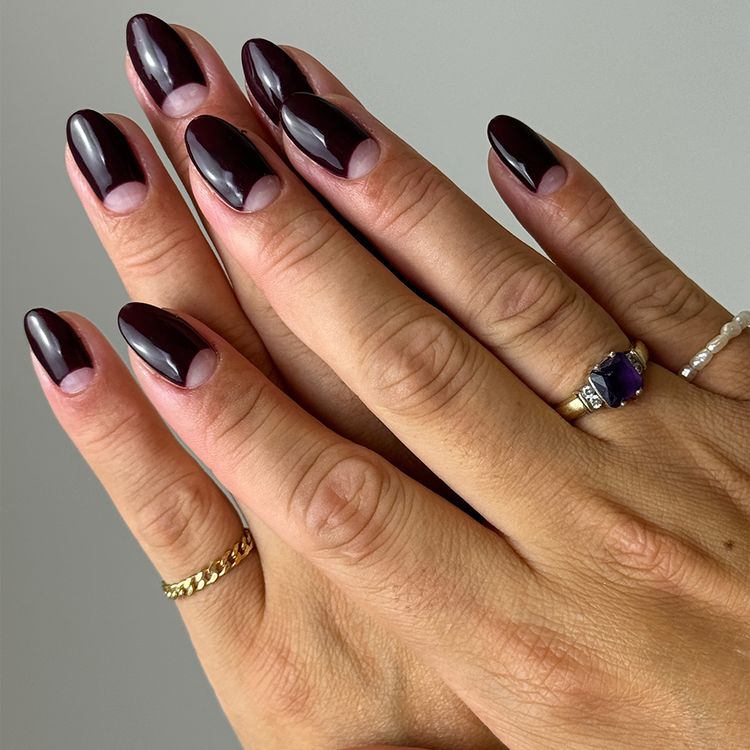 Dark half moon manicure