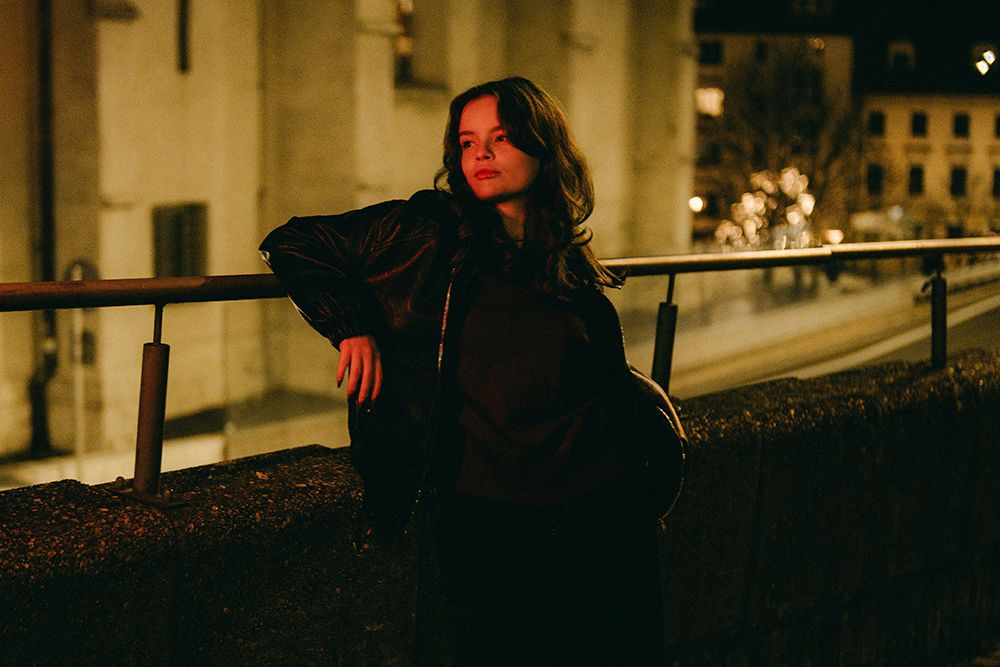 woman at night outdoors in city